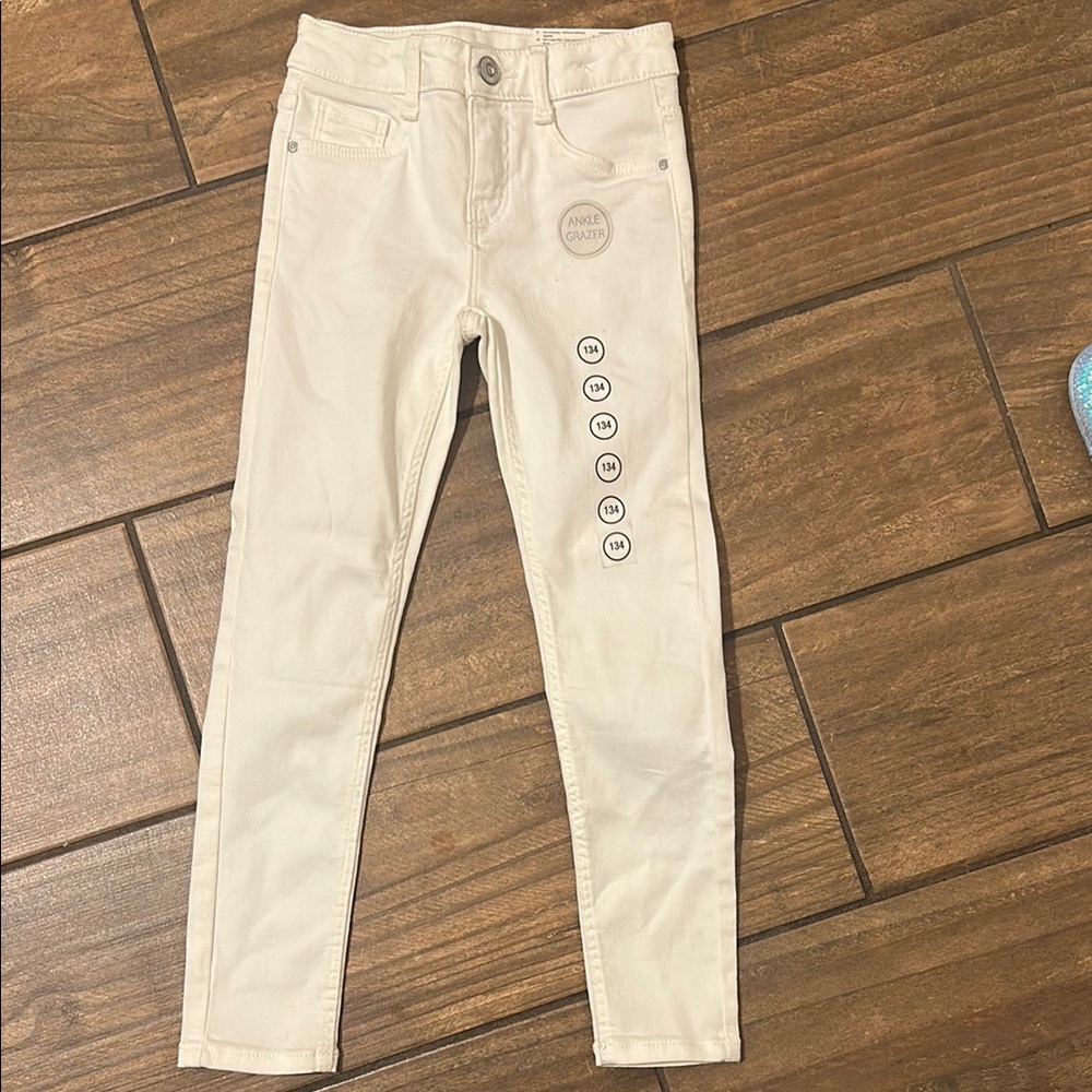 Beige Skinny Jeans with Button Detail